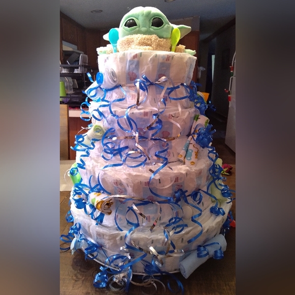 Hand made diaper cake with accessories attached - Picture 1 of 4